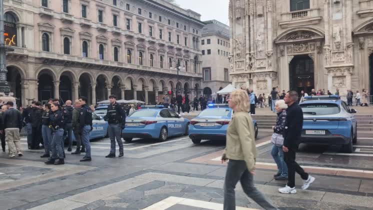 VIDEO: Police detain 160 as unrest continues for second day in Milan (2) Police detain 160 as unrest continues for second day in Milan (2) ..SHOTLIST:....MILAN, ITALY (OCT. 18, 2026) (ANADOLU - ACCESS ALL)....1. VARIOUS OF POLICE OFFICERS AT SQUARE OFFICERS DETAINING PEOPLE....2. VARIOUS OF PROTESTORS AND POLICE CLASHING....3. VARIOUS OF DAMAGED SHOPS, BROKEN WINDOWS POLICE OFFICERS NEAR SHOPSMILAN, ITALY - OCT. 18, 2026: Unrest continued in Milan on Sunday, Oct. 18, a day after protests against the rising cost of living and the Italian government.....Groups gathered around Piazza del Duomo before spreading into nearby streets. Demonstrators smashed vehicle windows, forced their way into a supermarket and damaged shopfronts.....Some masked demonstrators looted stores, built barricades using restaurant tables and rubbish bins, and threw objects at police vehicles. Police responded with water cannon, tear gas and batons. Some tourists sought shelter in shops that had not been targeted.....Police detained 160 people during Sundayâ€™s unrest, around 80% of them minors, ANSA news agency reported, citing Milan police sources.